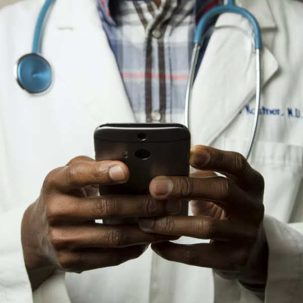 Doctor-Typing-on-Phone